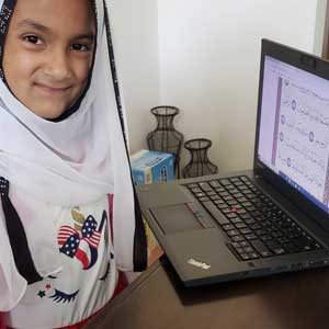 young girl read quran